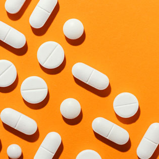 medicines on an orange background