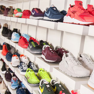 sneakers lined up in a store