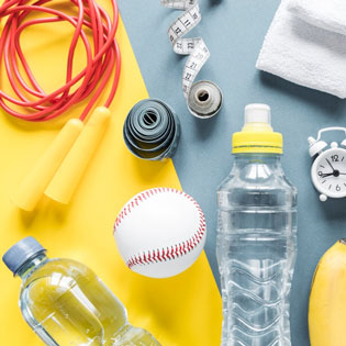 water bottle and sports equipment and fruits