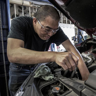 mechanic repairing a car