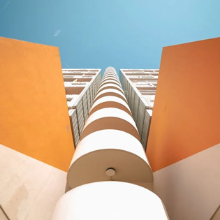 orange building with the sky
