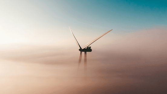 Éolienne au-dessus d'une mer de brume - illustration du secteur énergie et environnement