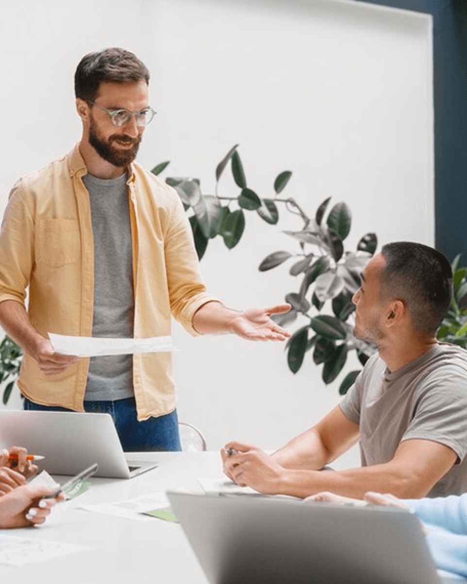 A team meeting to work on a digital media project